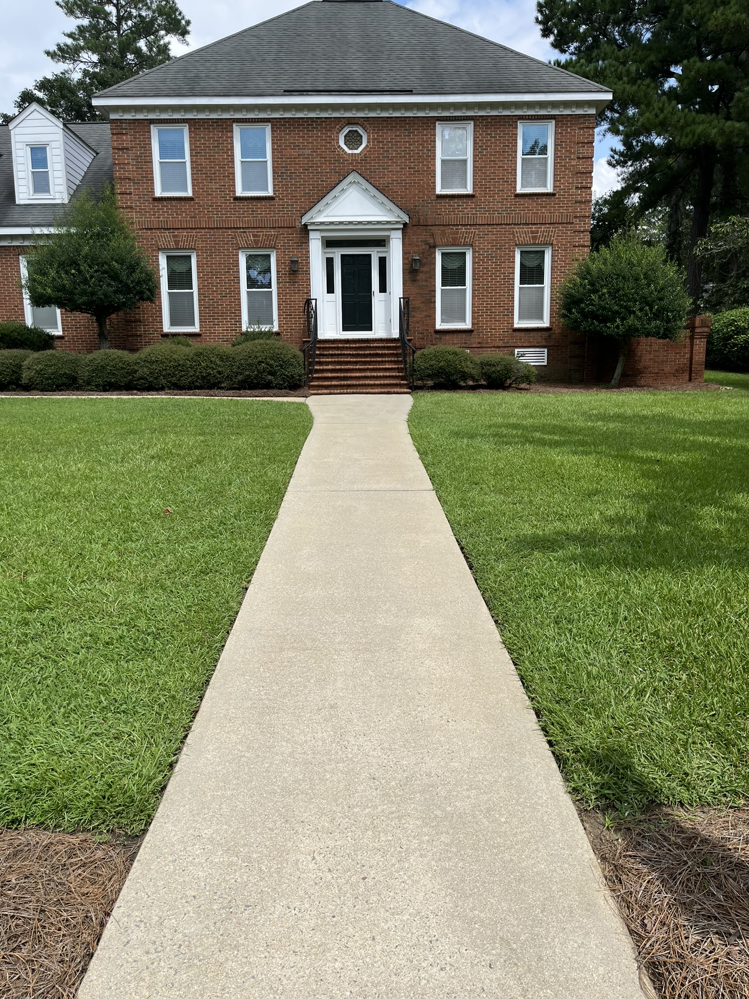 Sidewalk after pressure washing